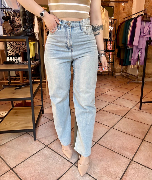 Jeans con inserto in tuta